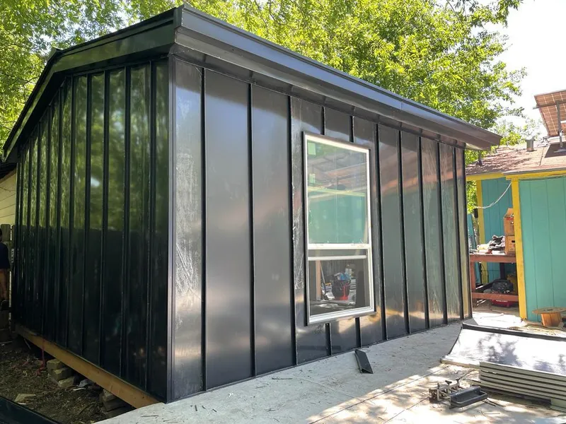 Black standing seam metal wall panels for Roof Inspection in Pearl City